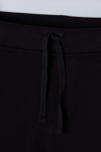 JOGGER DE MIC CON CORDÓN NEGRO PARA NIÑO