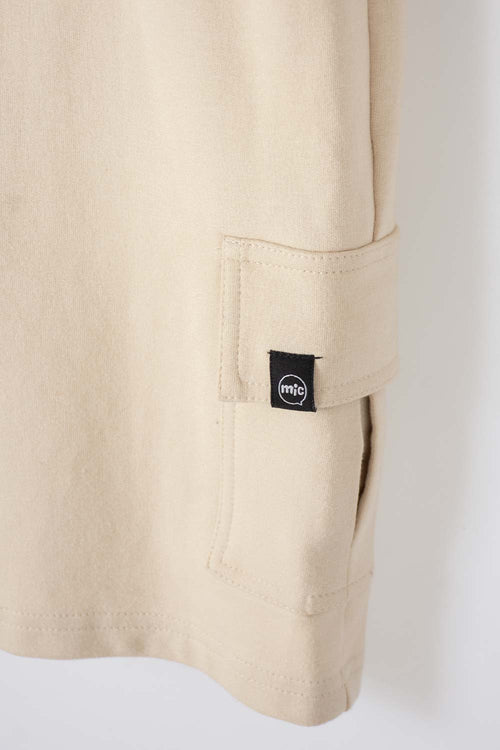 BERMUDA DE MIC CON BOLSILLOS LATERALES BEIGE PARA NIÑO