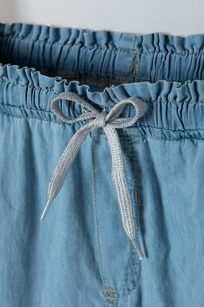 JOGGER DE MIC CON CORDÓN AZUL CLARO PARA NIÑA