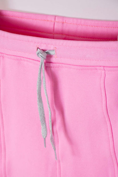 POLLERA DE MIC CON BOLSILLOS ROSADA PARA NIÑA
