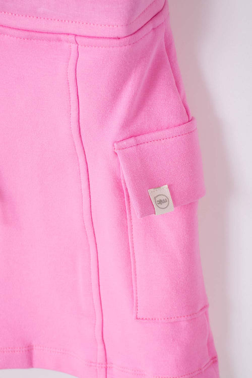 POLLERA DE MIC CON BOLSILLOS ROSADA PARA NIÑA