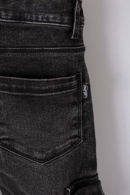 JEAN LITTLEMIC EN DENIM TONO OSCURO CON BOLSILLOS TIPO CARGO PARA NIÑO 2T A 5T