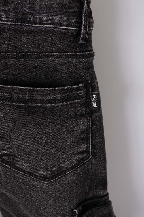 JEAN LITTLEMIC EN DENIM TONO OSCURO CON BOLSILLOS TIPO CARGO PARA NIÑO 2T A 5T